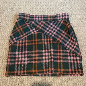 Never before worn new with tags. Plaid mini skirt